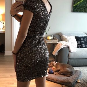 Sequin  “Dress the population” party dress